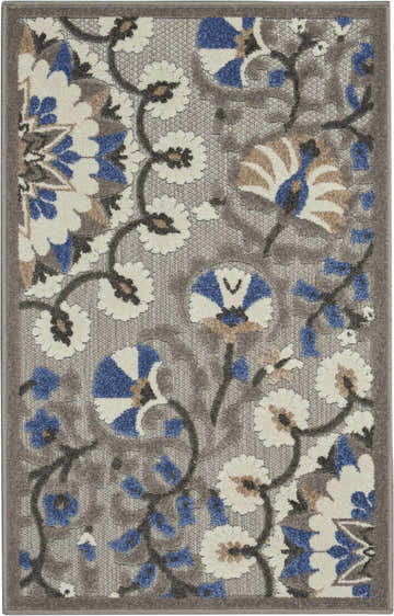 Close-up of Nourison Aloha Grey Multicolor rug. Floral pattern in gray, blue, tan, and cream on a textured background.