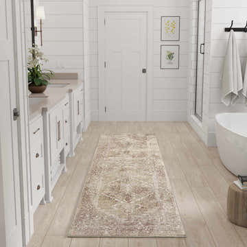 Bathroom scene with white cabinets and a rust multicolor Nourison Astra vintage runner rug on light wood floors.