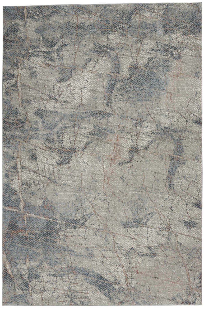 Close-up of Nourison Rustic Textures Light Grey Blue rug, showing a modern abstract pattern and subtle texture.