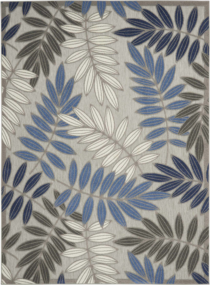 Close-up of Nourison Aloha Grey Blue Tropical Area Rug featuring a leaf pattern in blue, gray, and white.