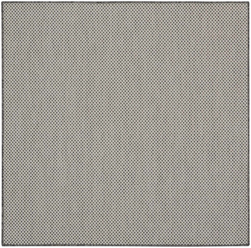 Close-up of the Nourison Courtyard Ivory Charcoal Modern Area Rug, featuring a diamond trellis pattern.