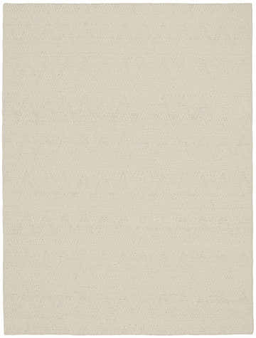 Close-up of the DKNY Pure Purl Ivory rug. This handmade wool rug has a subtle chevron pattern and a soft, neutral texture.