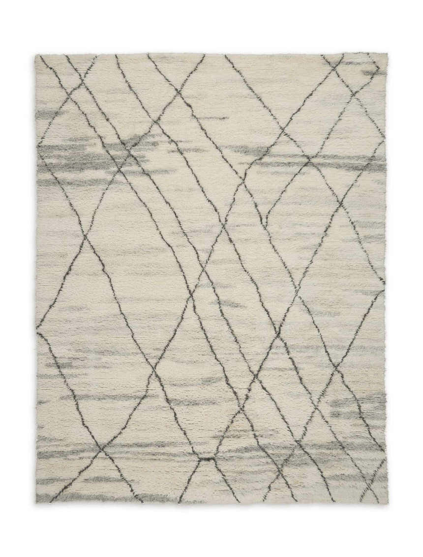 Close-up of the Calvin Klein San Antonio Ivory Multicolor Moroccan Rug, featuring a diamond trellis pattern and shag texture.
