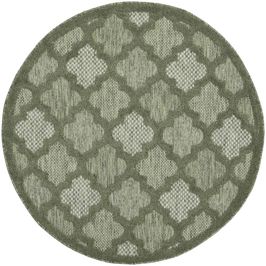 Close-up of a round Nourison Easy Care Green Modern Area Rug with a quatrefoil pattern.