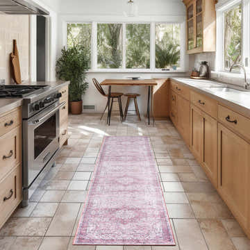 Bright kitchen with a Nourison Pink Vintage Indoor Washable Area Rug runner.