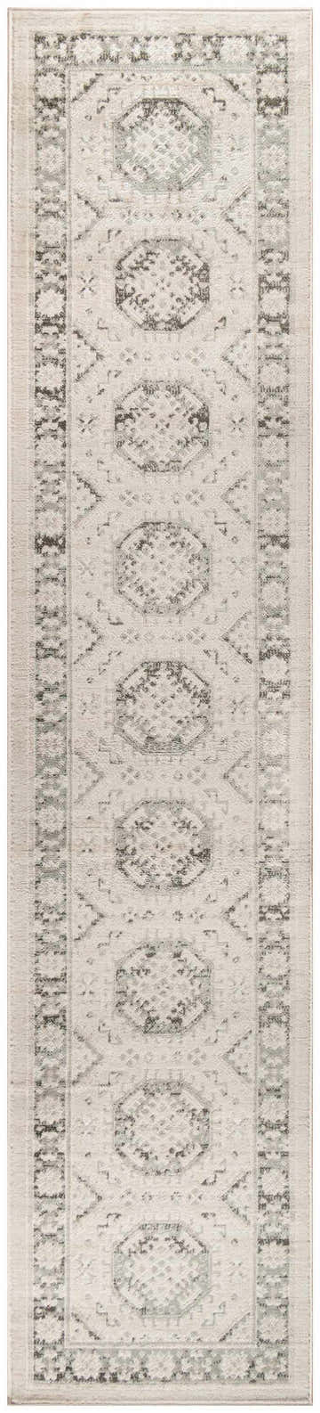 Close-up of the Nourison Serenity Home Ivory Grey rug, a vintage-style runner with geometric patterns and chestnut accents.