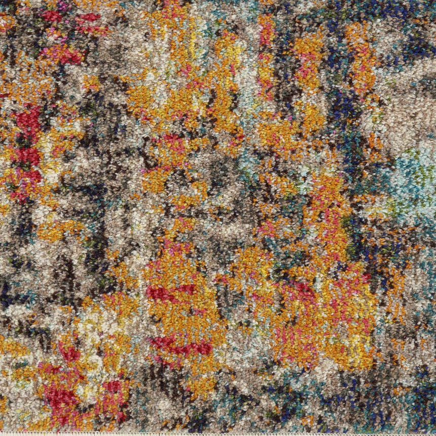 Close-up of the Nourison Celestial Multicolor rug. Modern design with orange, red, blue, and gray abstract pattern and soft texture.