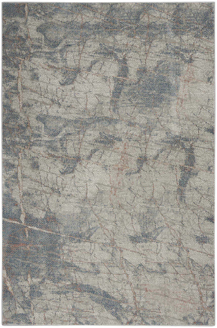 Close-up of Nourison Rustic Textures Light Grey Blue rug with a distressed, modern pattern and subtle texture.