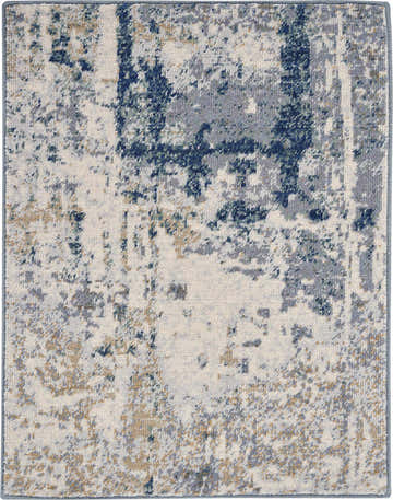 Close-up of Nourison Artworks Ivory/Navy rug. Abstract design with chestnut, ivory, and blue hues. Wool and cotton texture.