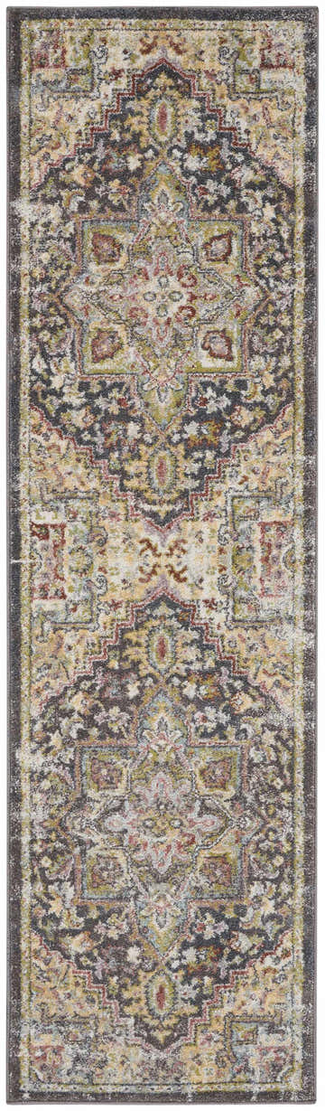 Close-up of Nourison Soraya Charcoal Multi rug. Colorful, taupe, gray, red, and green distressed geometric pattern.