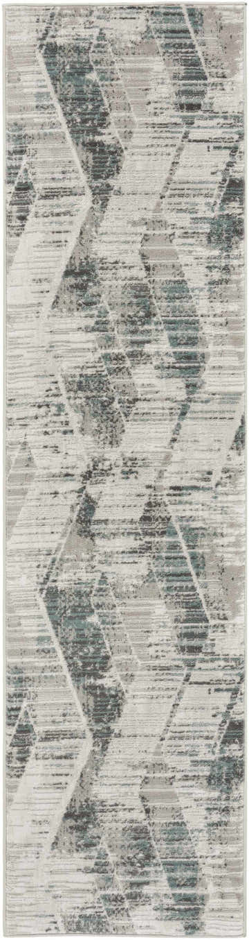 Close-up of Nourison Thalia Grey Beige rug. Modern runner with geometric design and distressed texture. Long pile rug.