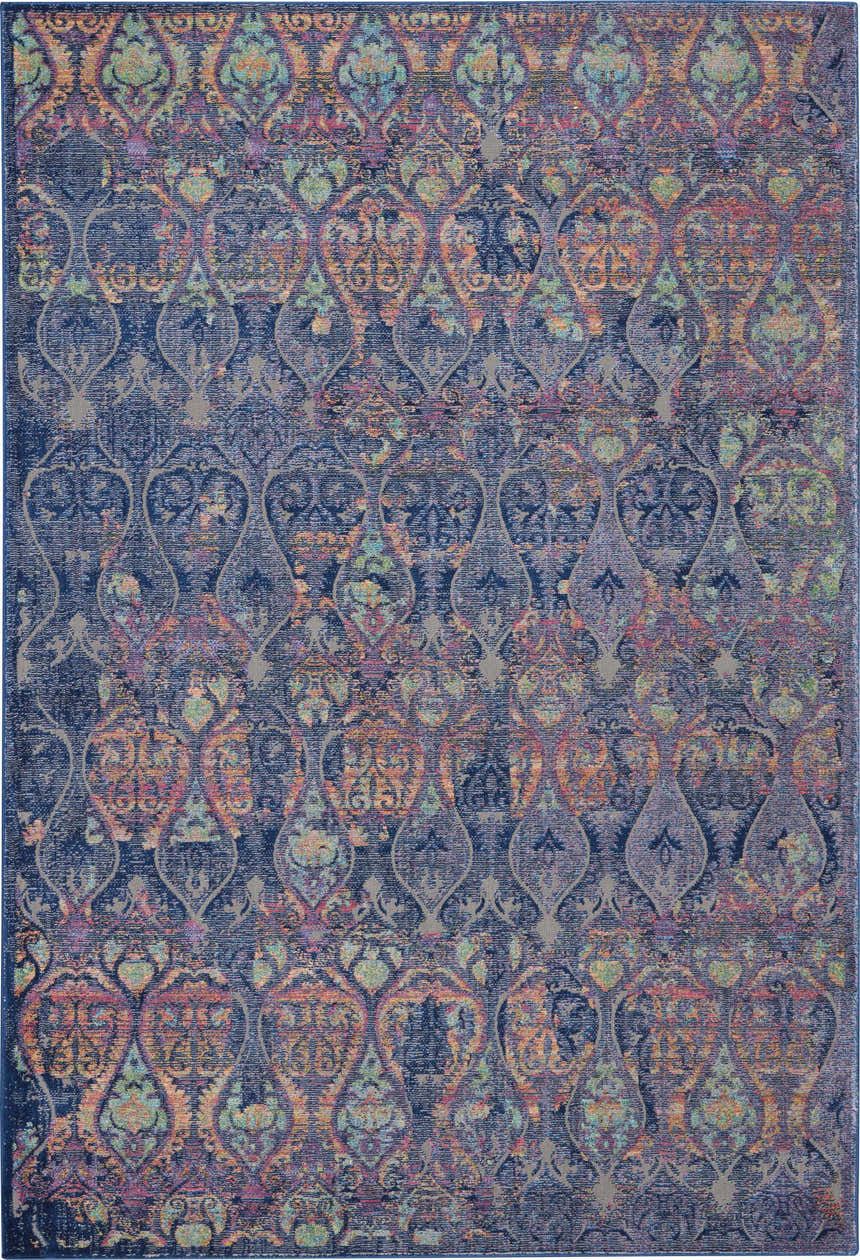 Close-up of the Nourison Ankara Global Navy Multicolor rug. Features a bohemian-inspired pattern with navy, orange, and teal accents.