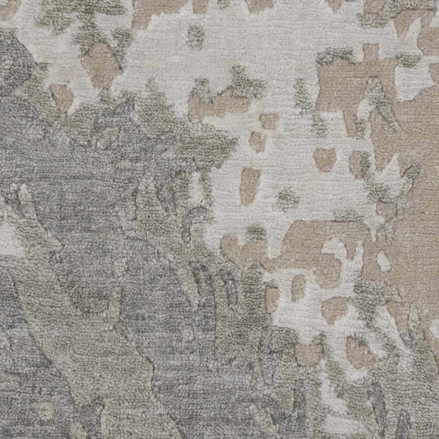 Close-up of the Nourison Silk Shadows Sand rug. Abstract sandstone, gray, and ivory pattern with a soft, textured pile.
