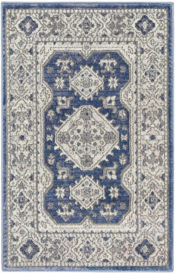 Close-up of the Nicole Curtis Series 4 Grey Navy Vintage Rug, featuring a detailed traditional pattern and long pile texture.