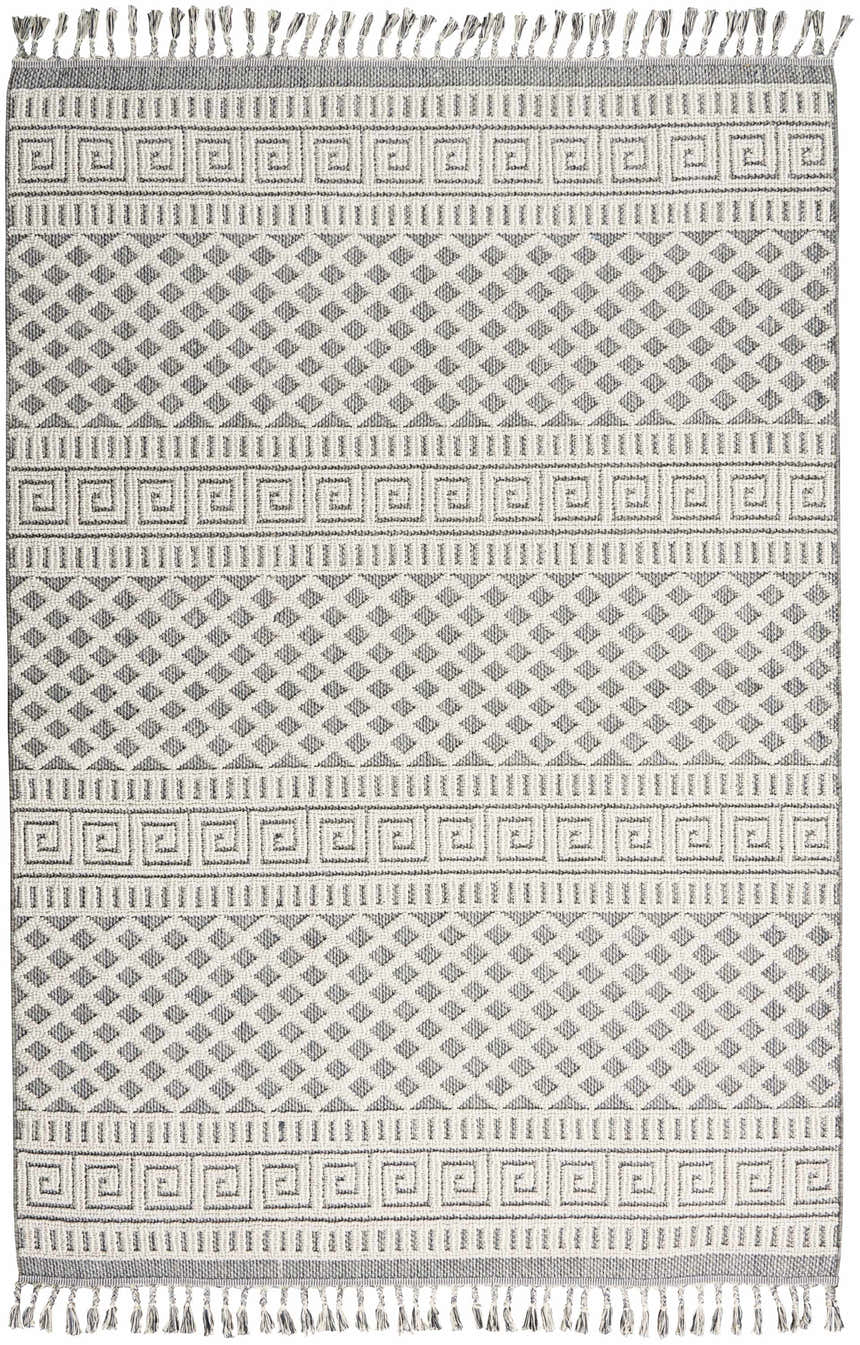 Close-up of Nourison Paxton Ivory/Slate rug. Modern design with geometric diamond and Greek key patterns. Tasseled fringe.