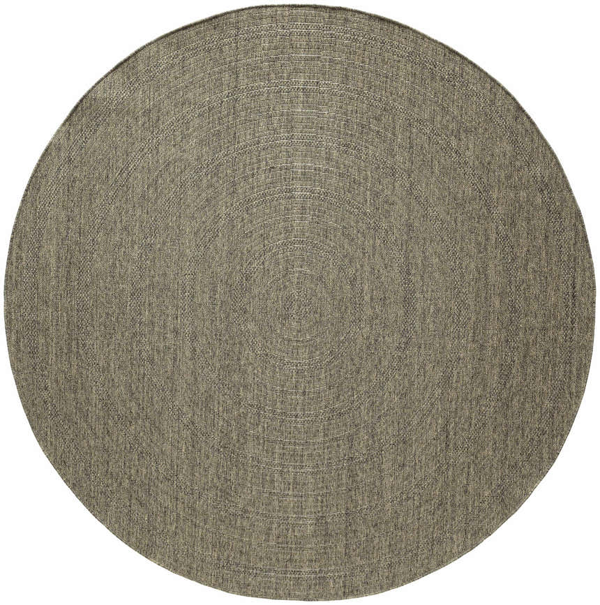 Close-up of the round Nourison Tulum Olive Outdoor Area Rug featuring a subtle concentric pattern and durable pile.