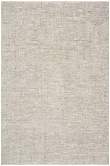 Close-up of DKNY DK014 Madison Grey rug. Modern, machine-made pile with subtle texture and neutral gray color.