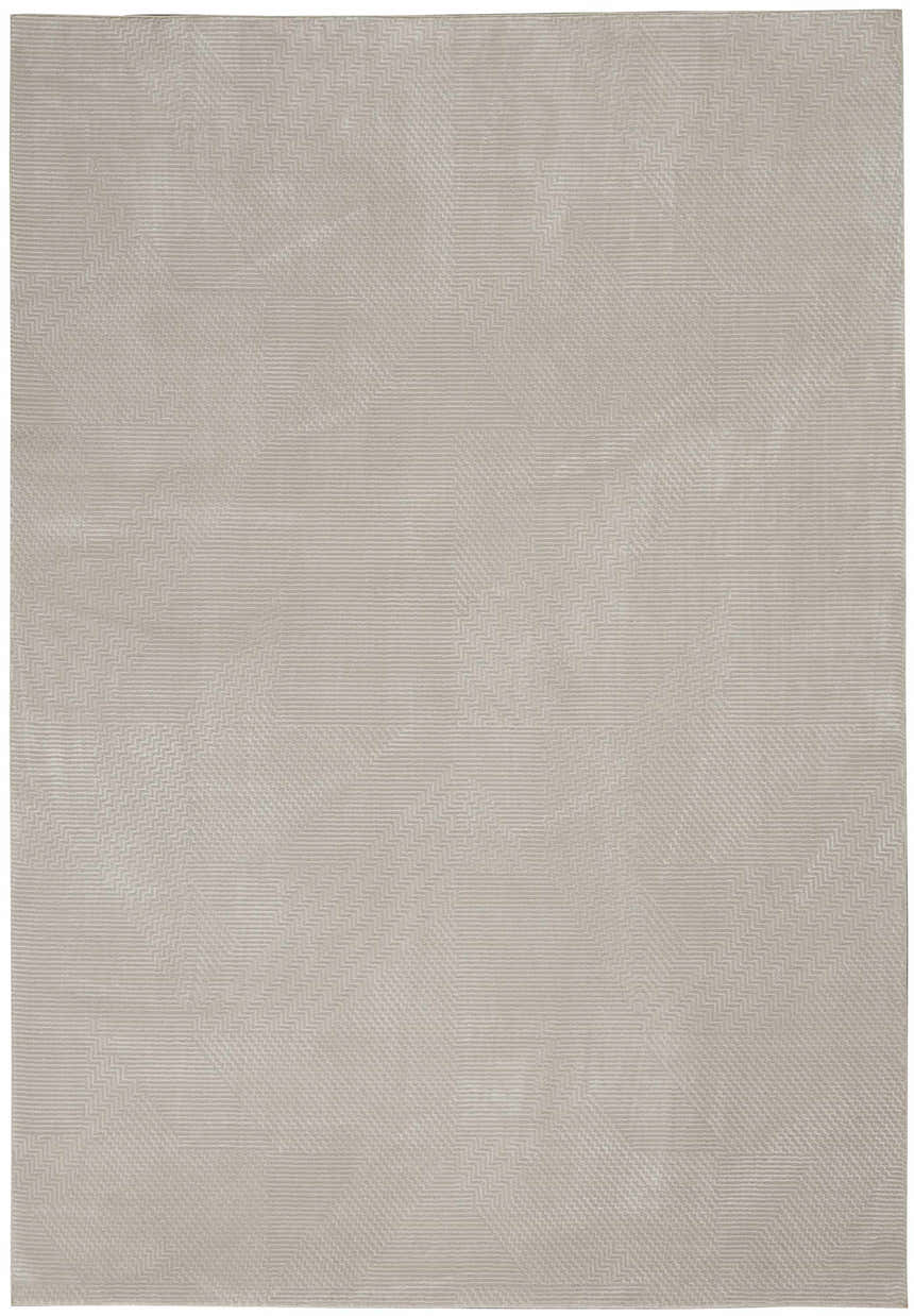 Close-up of the Calvin Klein Orlando Grey Beige rug, featuring a subtle geometric pattern and soft, neutral tones.