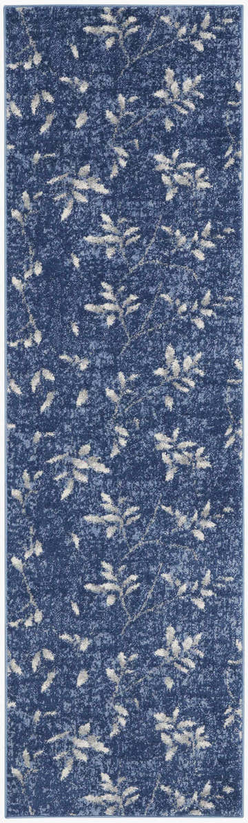 Close-up of Calvin Klein River Flow Navy Ivory rug with a farmhouse style leaf pattern and subtle texture.