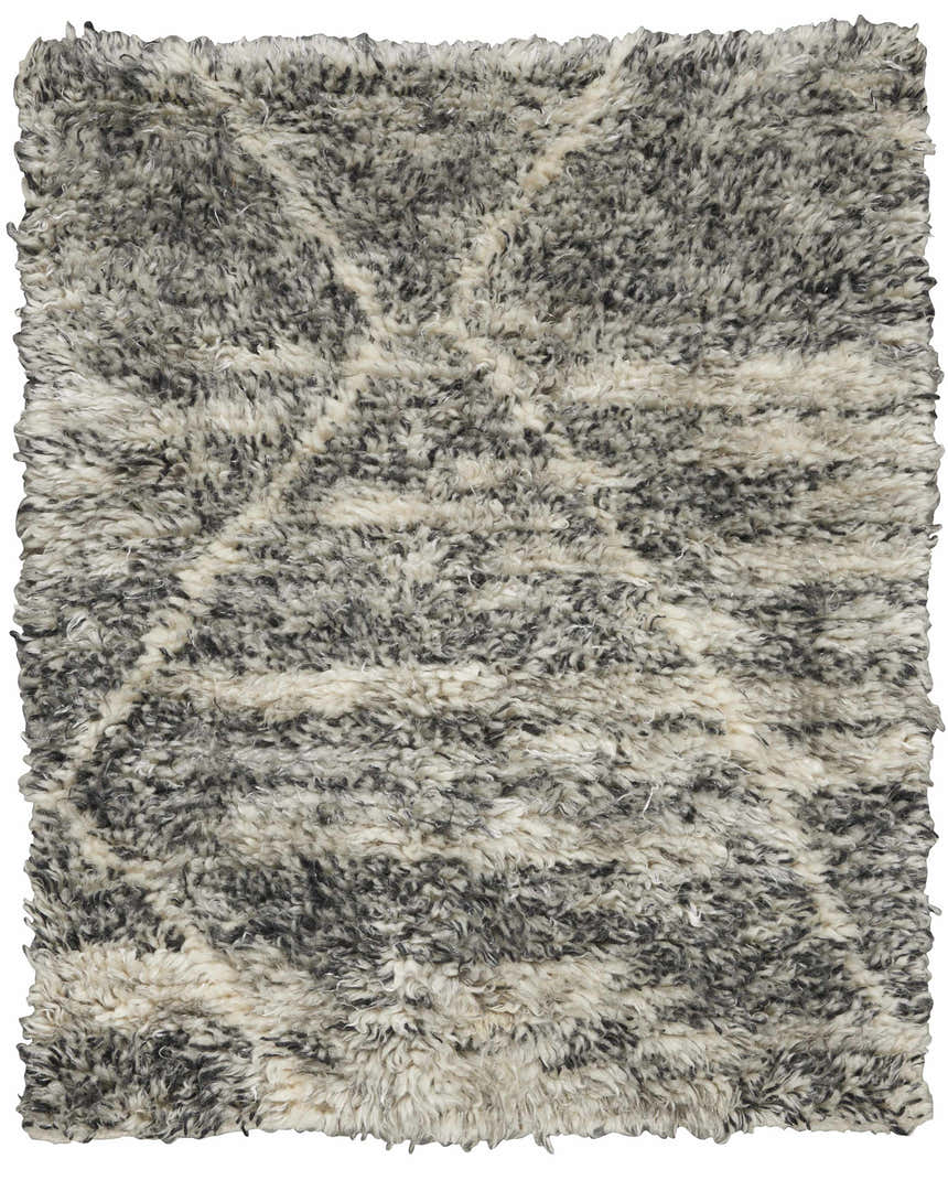 Close-up of the Calvin Klein San Antonio Charcoal Ivory rug. Shag texture with a subtle Moroccan-inspired design.