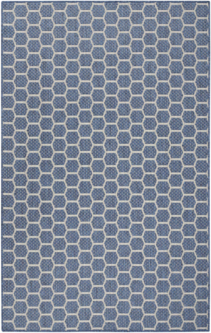 Close-up of Nourison Twist Reversible Blue Modern Area Rug featuring a geometric honeycomb pattern.