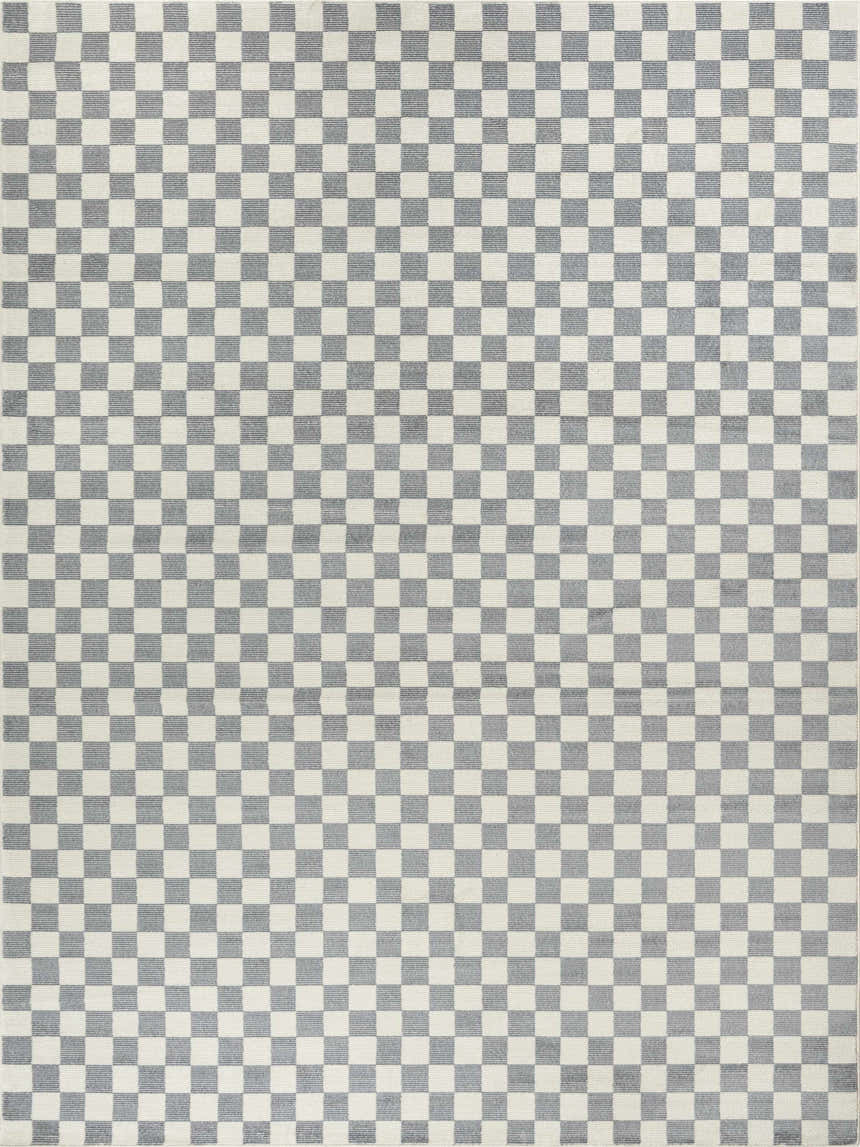 Close-up of the Nourison Serenity Home Ivory Blue rug featuring a modern checkerboard pattern.