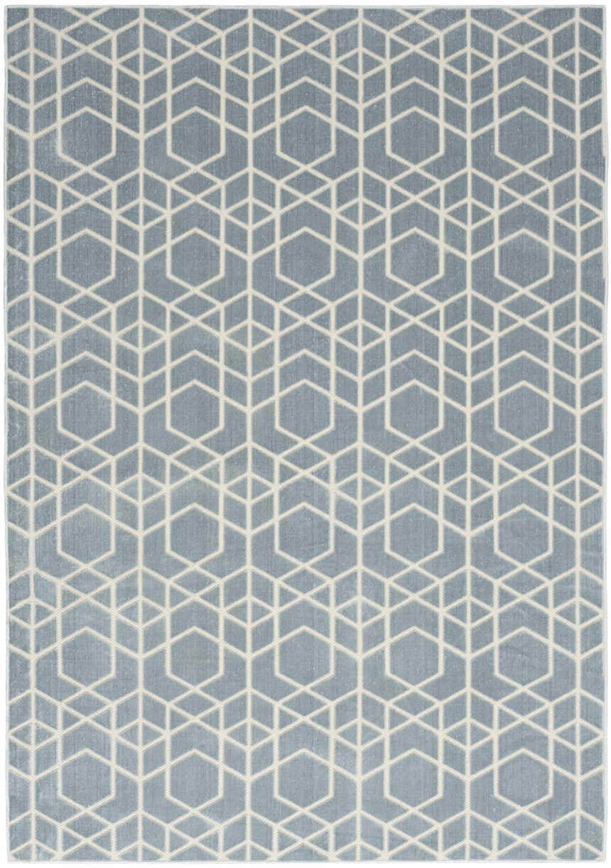Close-up of Nourison Charm Blue Ivory Rug. Modern geometric pattern in blue and ivory. Washable area rug.