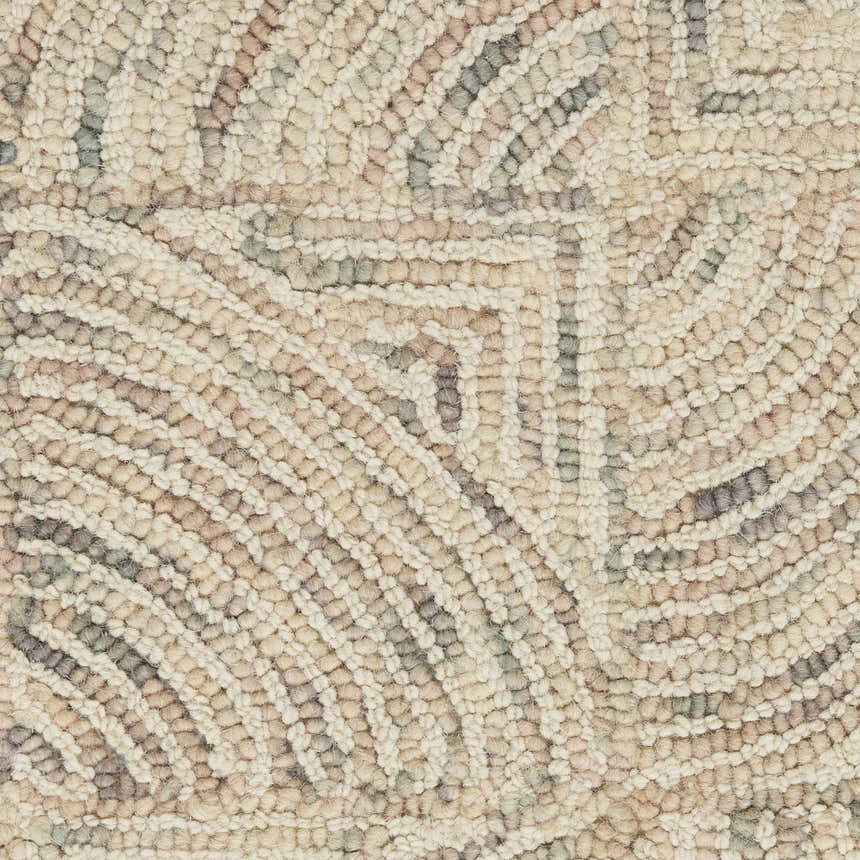 Close-up of the handmade Nourison Interlock Ivory Multicolor rug. Features a looped wool texture and mid-century modern design.