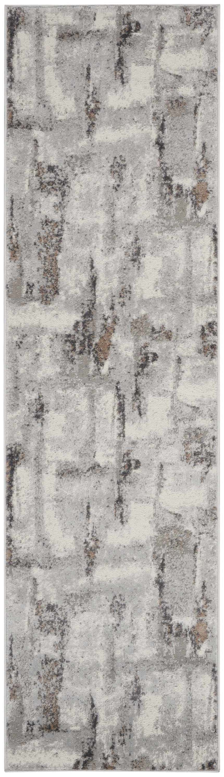 Close up of Nourison Elation Grey Ivory rug featuring a modern abstract design with chestnut accents. High pile texture.