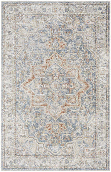 Close-up of Nourison Astra Denim Multicolor rug. Vintage style, machine-made with blue, beige, and rust colors.