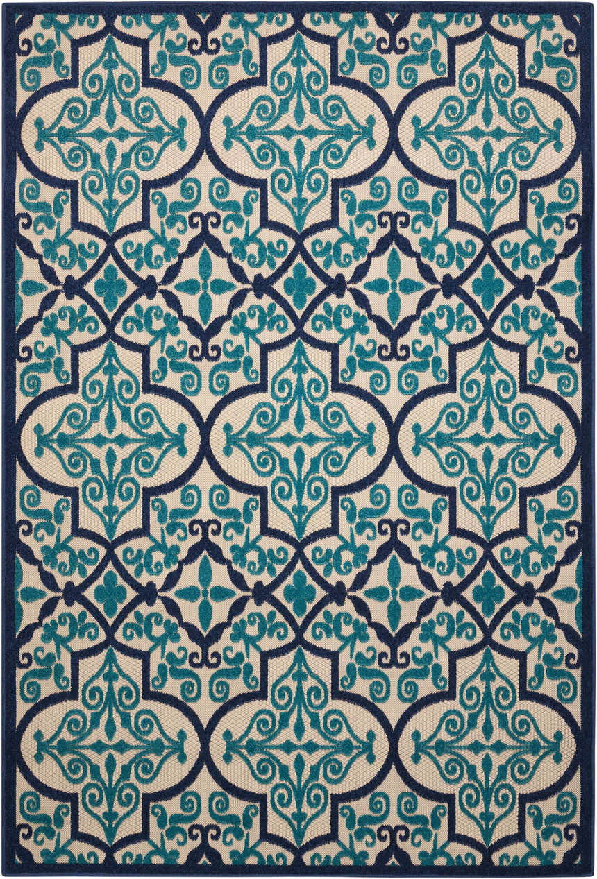 Close-up of the Nourison Aloha Navy Bohemian Area Rug. Features a geometric pattern in navy and teal on a beige background.