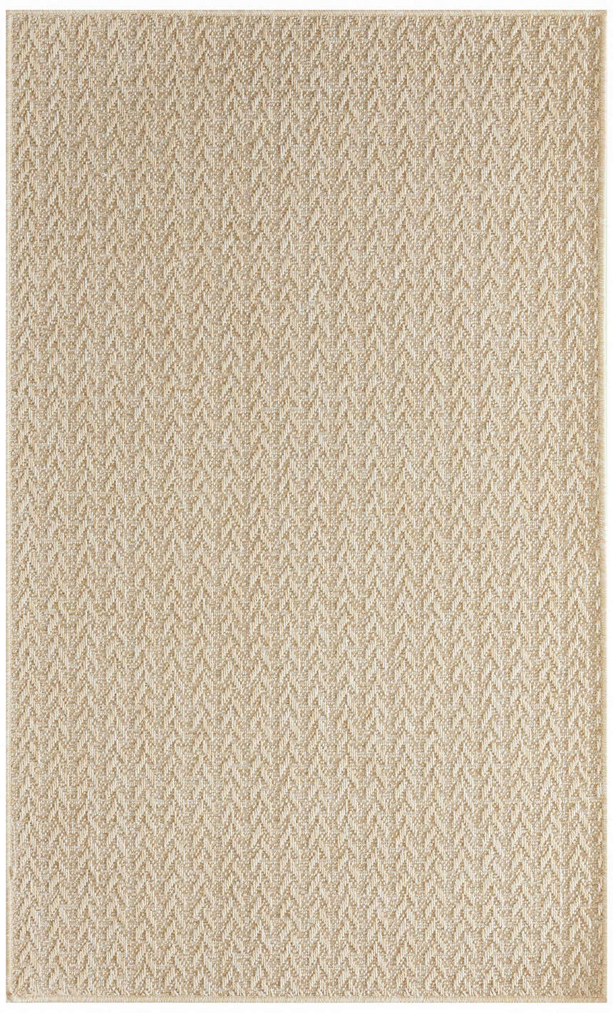 Close-up of the Nourison Tulum Cream Outdoor Area Rug showing its subtle herringbone pattern and textured pile.