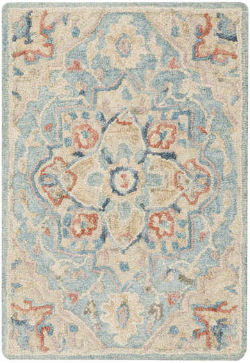 Close-up of the handmade Nourison Maison Light Blue Ivory vintage rug, featuring a floral chestnut pattern.