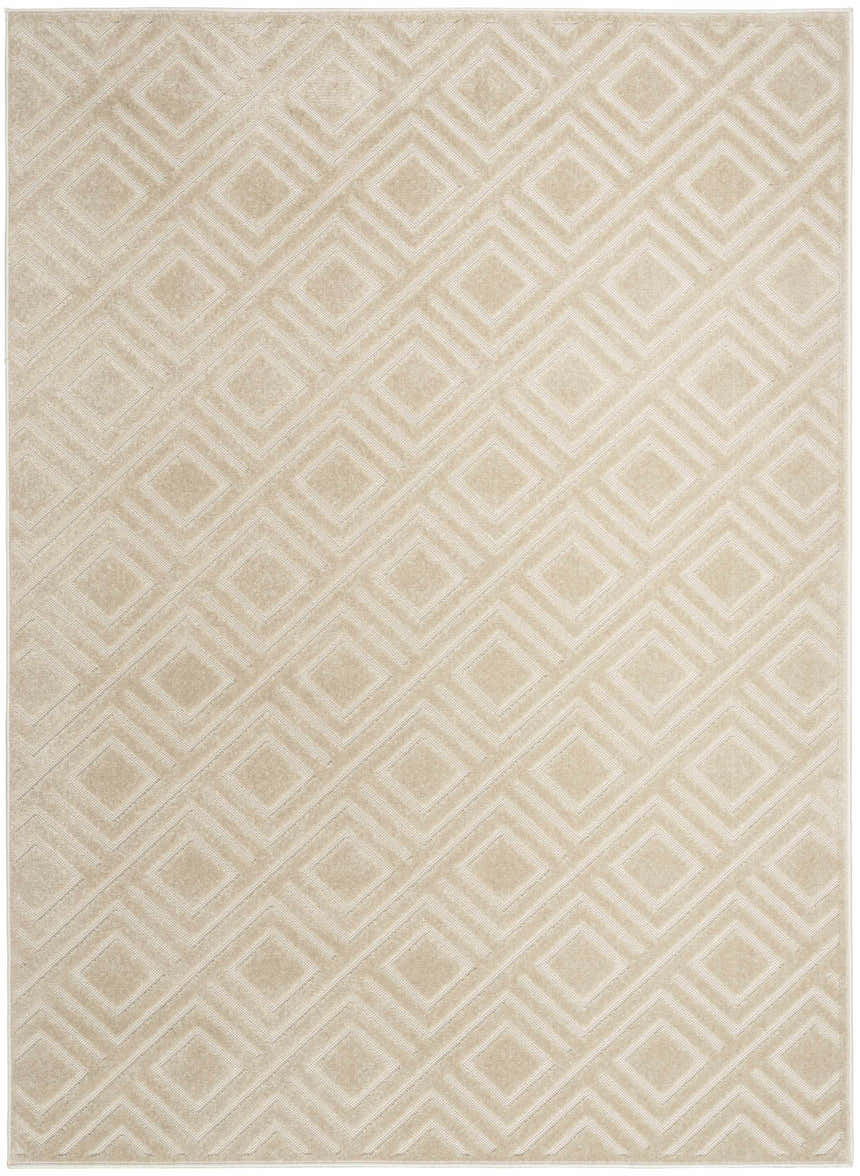 Close-up of the Nourison Care Free Beige rug featuring a geometric diamond pattern and soft, neutral tones.