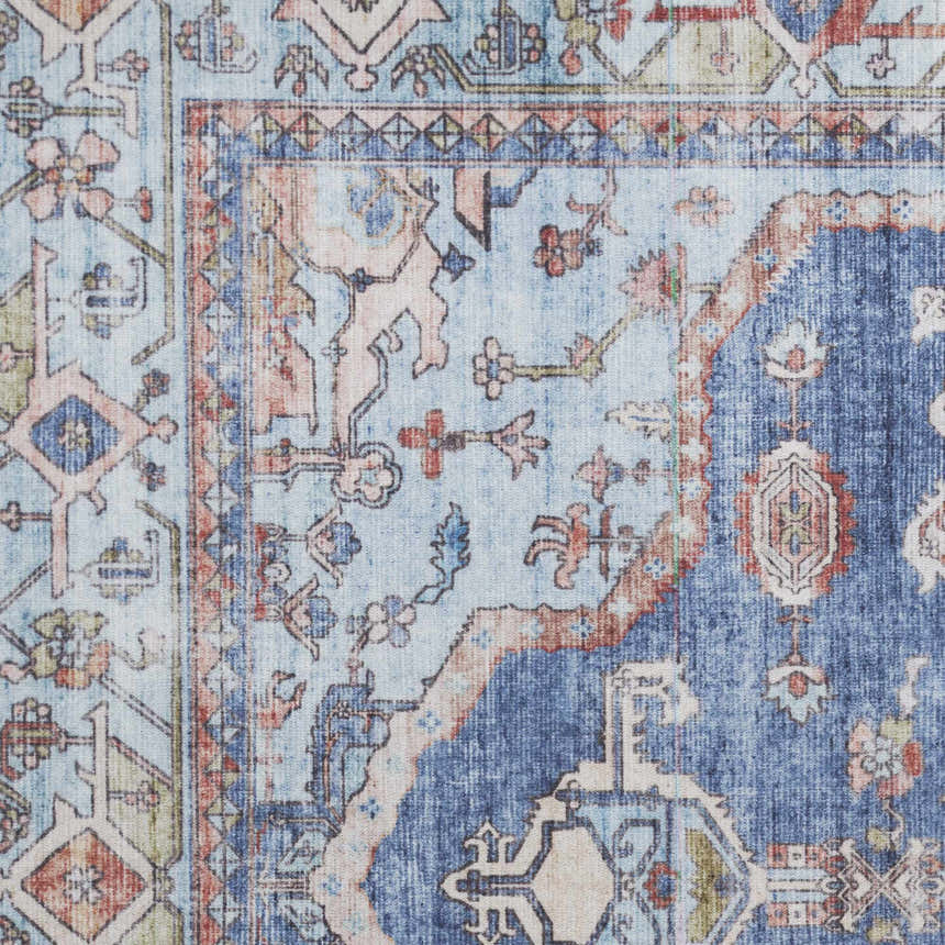 Close up of the Nourison Fulton Blue Vintage Indoor Area Rug, featuring floral and geometric patterns.