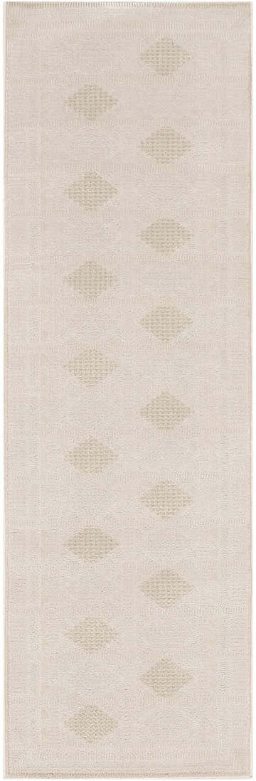 Close-up of a Nourison Nordic Ivory Beige rug, featuring a subtle diamond pattern and soft pile.