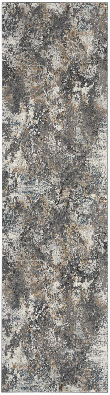 Close-up of the Nourison Tangra Grey Multicolor rug. Abstract design with gray, white, blue, and gold tones.