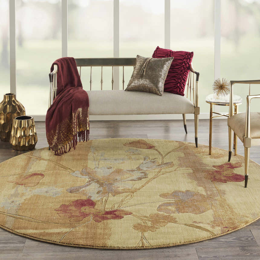 Living room scene with a round Nourison Somerset Beige Farmhouse area rug featuring a floral design.