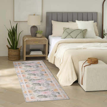 Farmhouse bedroom with Nourison Botanical Beige Multicolor rug. Floral runner adds soft color to neutral decor.