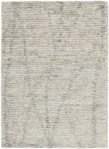 Close-up of the handmade Nourison Ellora Stone Scandinavian rug, showcasing its sandstone color and textured, horizontal pattern.