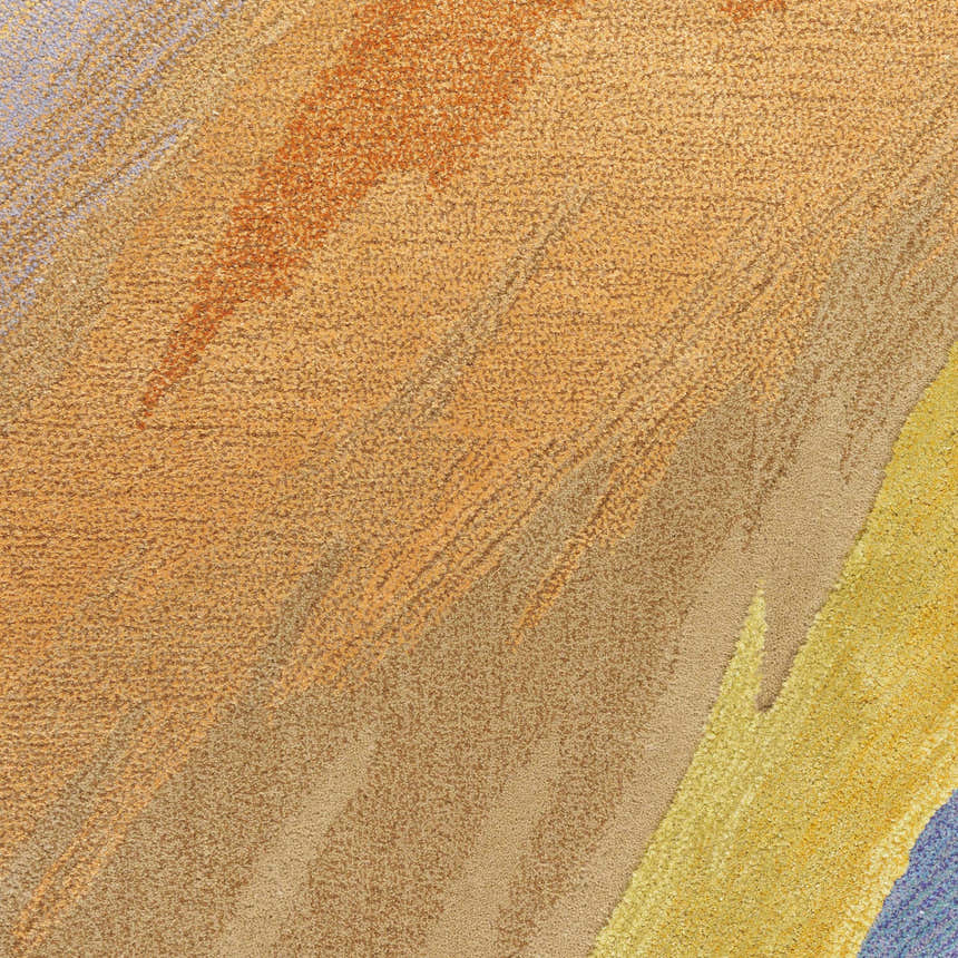 Close-up of the Nourison Prismatic rug. Features a textured, multicolor pattern in shades of gold, yellow, orange and blue.