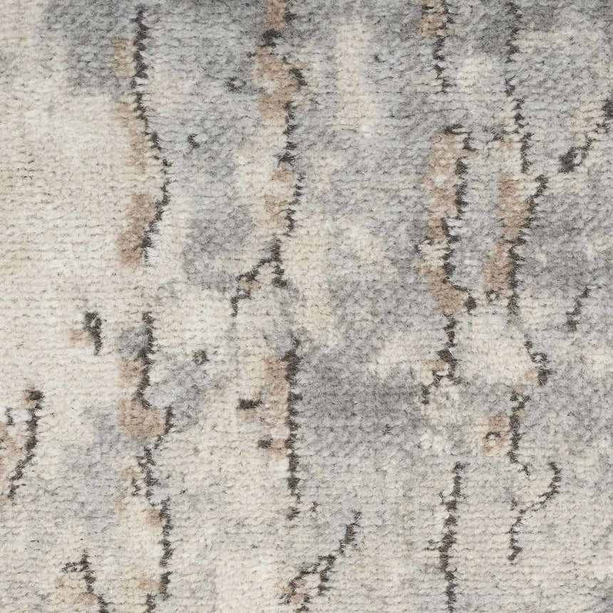 Close up of the Nourison Quarry Beige Gray rug. Shows texture and mid-century modern design.