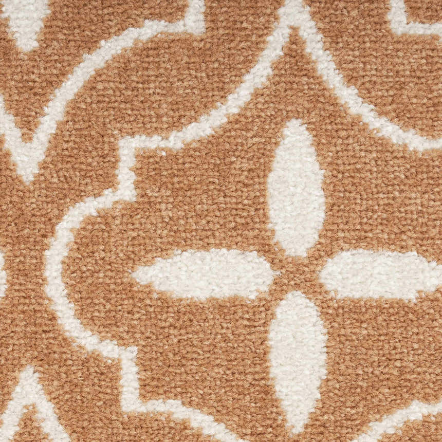 Close-up of the Nourison Essentials Copper Modern Area Rug, caramel and white floral pattern, textured polypropylene.