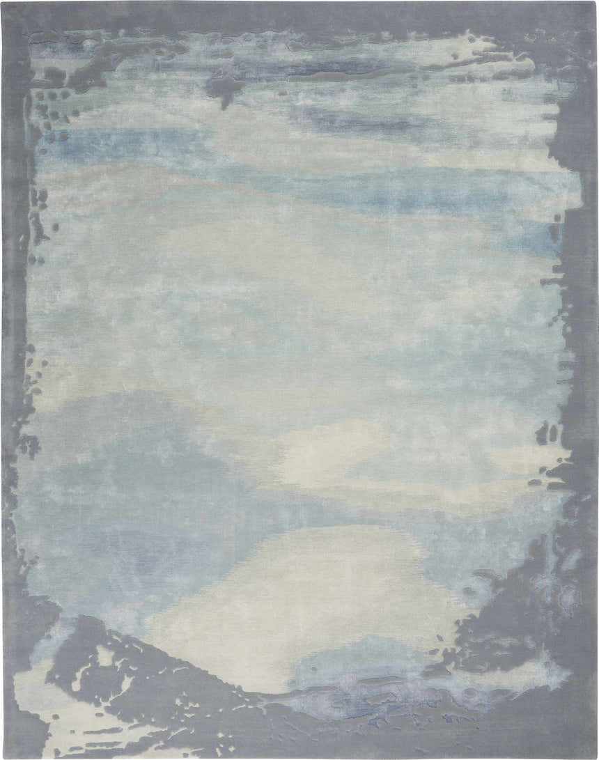 Close-up of the Nourison Prismatic Seafoam Silver rug, featuring an abstract design in seafoam, silver, and blue hues.