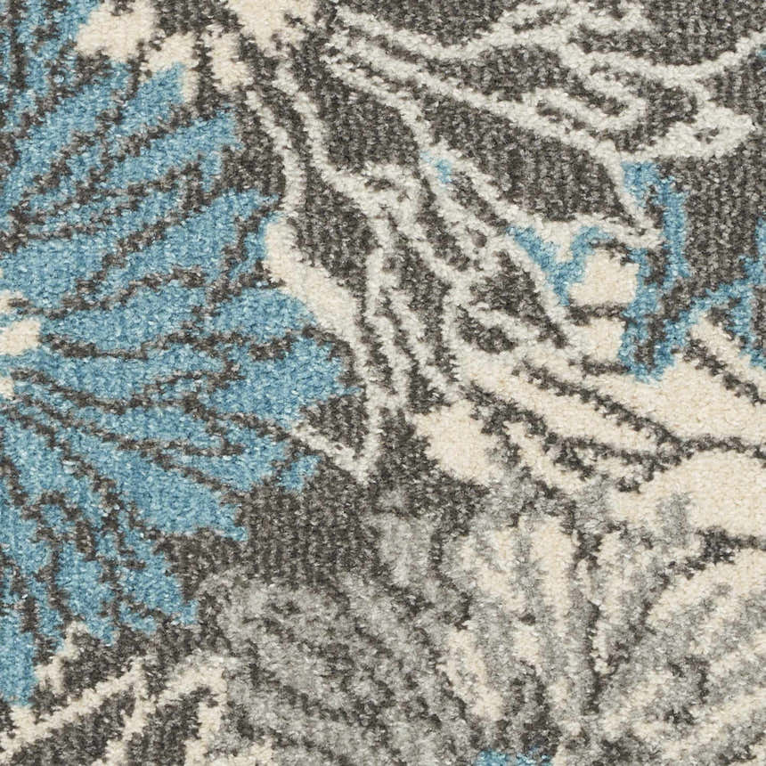 Close-up of the Nourison Passion Charcoal Blue rug showing its floral pattern and taupe, gray, and blue colors.