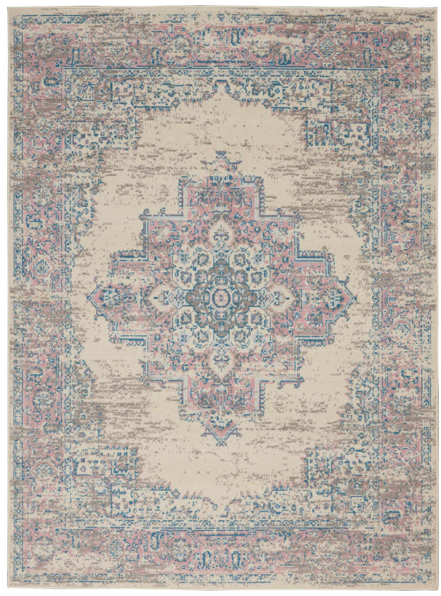 Close-up of Nourison Grafix Ivory Pink Vintage Indoor Area Rug, featuring a distressed floral medallion pattern.