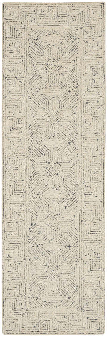 Close-up of the handmade Nourison Colorado Ivory Navy rug with geometric mid-century modern design.