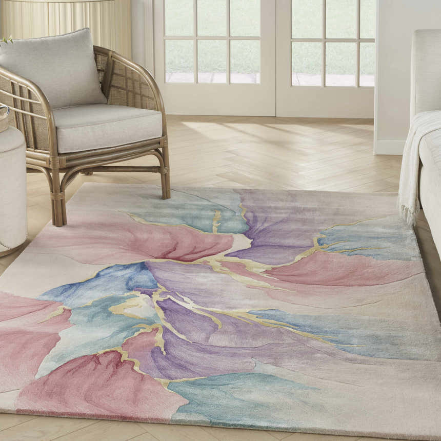 Serene living room with a Prismatic Ivory area rug featuring a floral design in pink, blue, and purple hues.