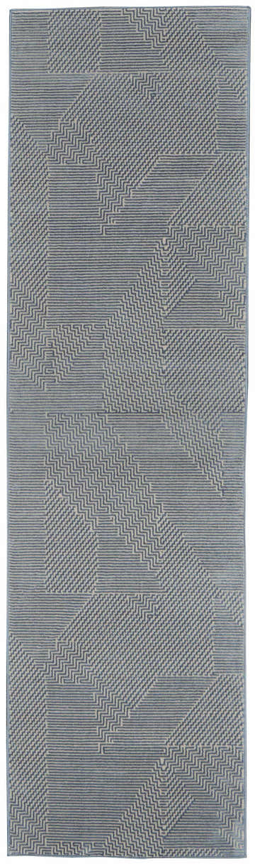 Close-up of Calvin Klein Orlando Grey Blue rug featuring a geometric, mid-century modern pattern.