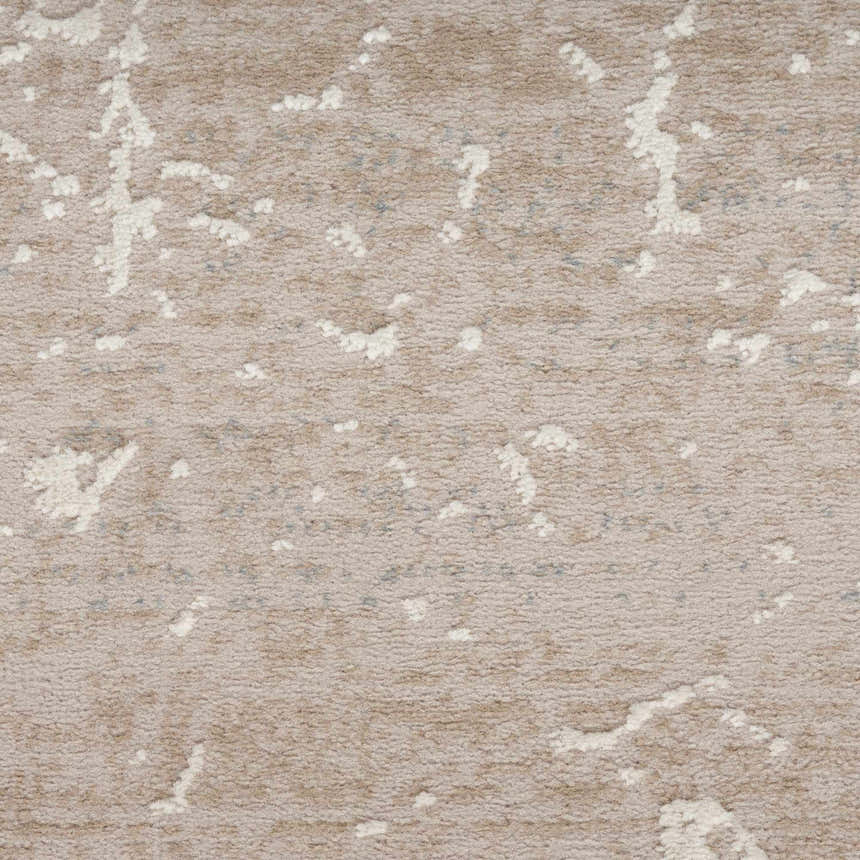 Close-up of the Nourison Exhale Mocha Ivory rug showing its high pile texture and abstract chestnut and ivory pattern.